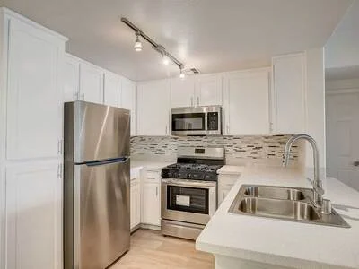 Stainless steel appliances in a modern kitchen