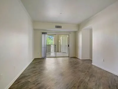 Living room with premium flooring and window