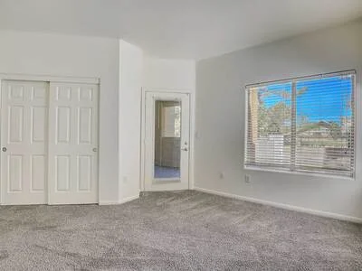 Spacious bedroom with natural lighting
