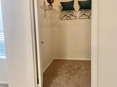 Interior view of a spacious walk-in closet