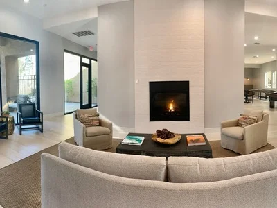 Cozy clubhouse lounge area with fireplace