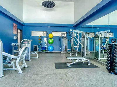 Interior of the on-site gym with modern exercise equipment