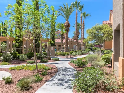 Scenic walkway through Ritiro Apartments community